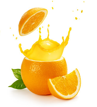 orange juice splashing out of a fruit isolated on white
