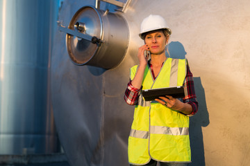 female engineer in contemporary winemaker factory