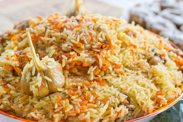 Large plate of Pilaf with garlic close up