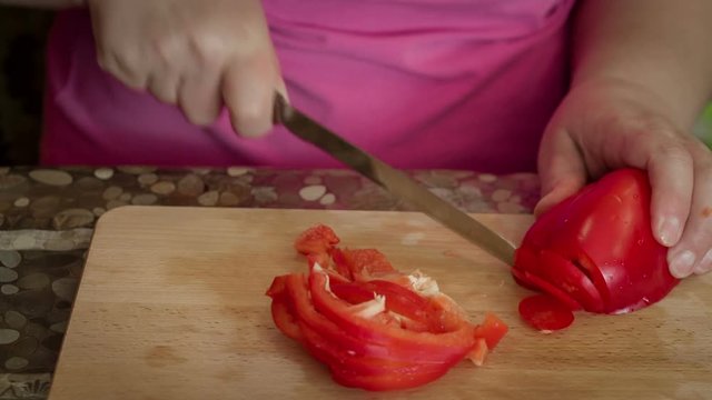 Cooking Pizza. Sliced ​​Red Pepper On The Cutting Board
