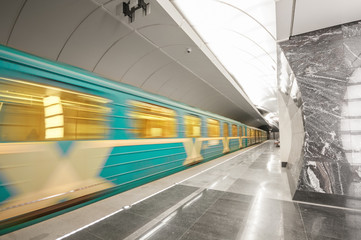 Moving train at metro station