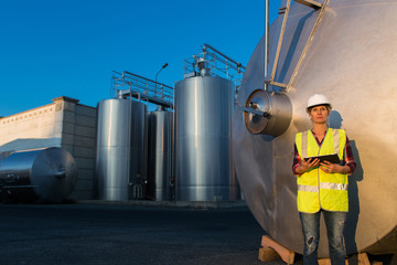 female engineer in contemporary winemaker factory