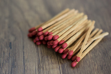 matches on wood table baclground.