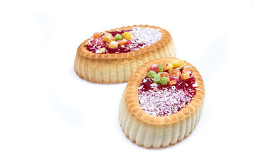 tasty biscuits with marmalade isolated on white background 