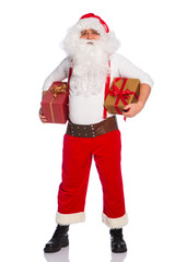 Portrait of happy Santa Claus holding Christmas gifts

