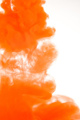 orange paint in water