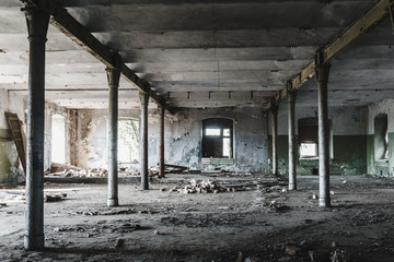 Industrial building interior of abandoned wharehouse in dark colors