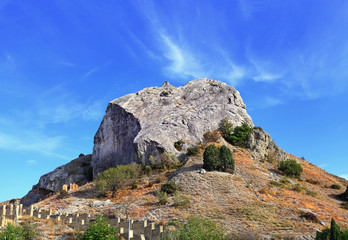 Rock on a background of blue sky
