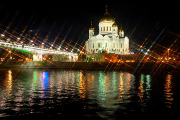 View of the Temple of Christ the Savior in Moscow at night. The views from the river. Star filter. Landscape orientation