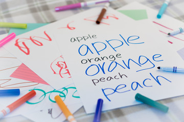 English; Kids Writing Name of the Fruits for Practice