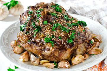 Baked meat with garlic, spices and chimichurri sauce