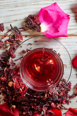 Red Hibiscus tea in glass mug