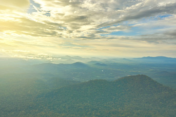 Mountains, cloudscape, fog and morning sunshine