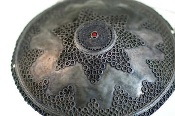 Detail, intricate silver headpiece