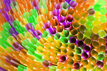 Colorful drinking straws close-up background