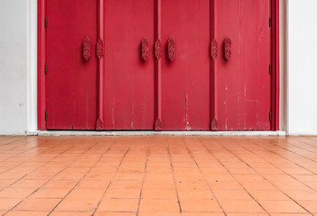 Red wooden old style doors