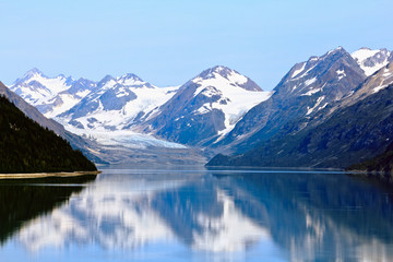 Boat sailing past Alaskan Glacier Landscape 