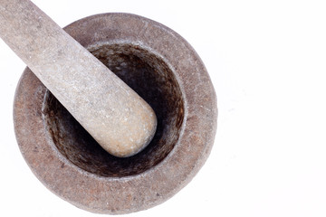 old granite stone mortar and pestle are Thai cooking tool on white background food isolated 
