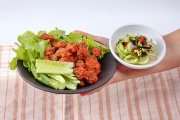 Ready curried fish cake served. Selective focus