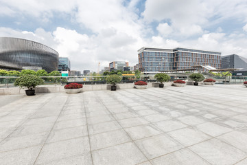 modern buildings in shanghai from empty brick floor