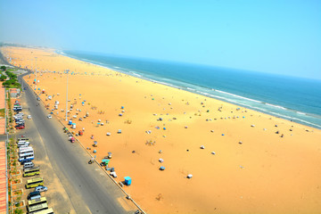 Marina beach in Chennai City, India. It is one of the popular tourist attraction in Chennai. It is longest urban natural beach in India, situated along the coast of Bay of Bengal. - obrazy, fototapety, plakaty