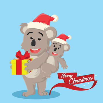 Koala Holding Christmas Present With Its Son