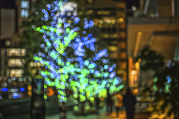 Blur colorful bokeh background of light decorate at night in important day Tokyo city.
