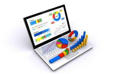 ノートパソコンとビジネス資料