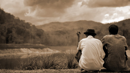 CHIANGRAI, THAILAND - May 2016 : Two man talk about lake and for