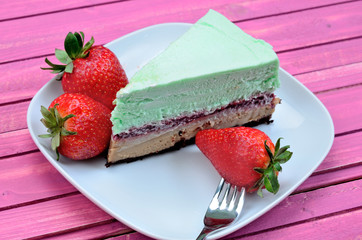 part of cake mousse with strawberries