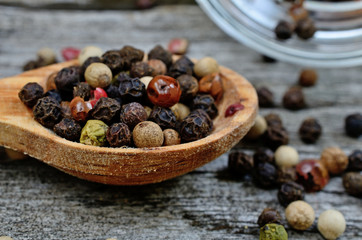 peppercorn in spoon on table