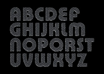 letters of the alphabet in the style of blister foils on a black background 