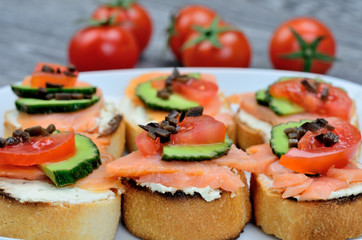 salmon bruschetta on dish