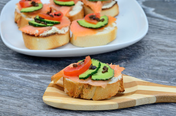 bruschetta on spoon on table