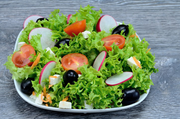 salad in white dish on table
