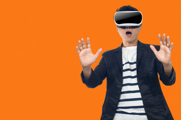 Young man with virtual reality goggles.