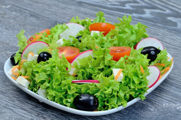 salad in white dish on table