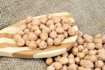 chickpea in spoon on sack