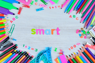 word smart color letter and stuff for school on table