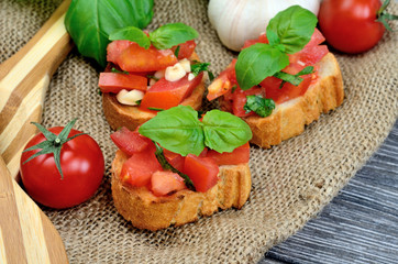 tomato bruschetta on rustic cloth