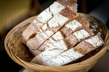 bread in basket - little roll breads in basket on table