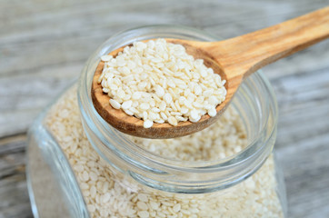 sesame in spoon on table