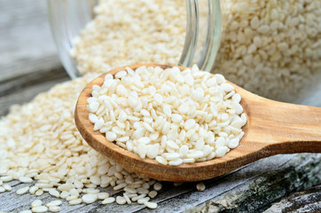 sesame in spoon on table