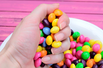hand hold color candy