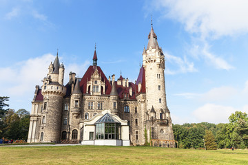 Fototapeta na wymiar View on 17 th century Moszna Castle on a sunny day, Poland