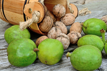 walnut in bucket flow on table