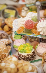 vertical background with fresh sweet baked cakes