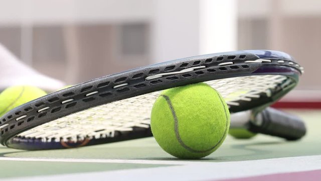 Tennis Ball with racket on tennis court for sport outdoor in exercise