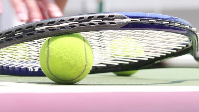Tennis Ball with racket on the Court tennis for playing in sport fitness
