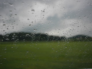 landscape through rainy window